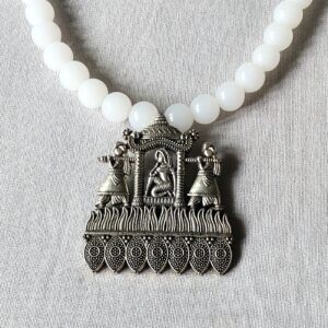 White beads necklace with antique pendant
