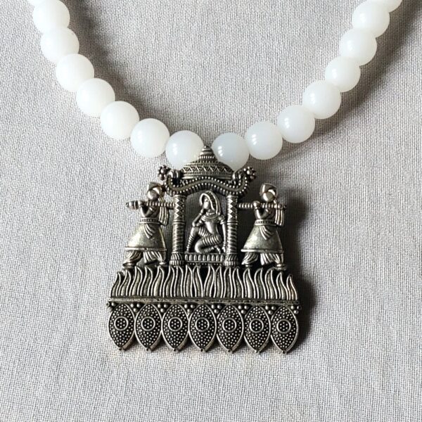White beads necklace with antique pendant