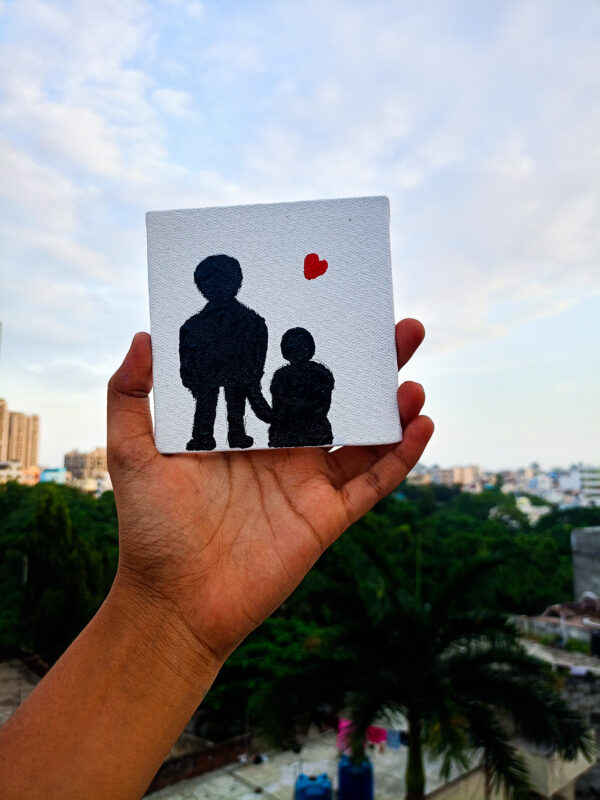 Handmade silhouette art-father and daughter red heart